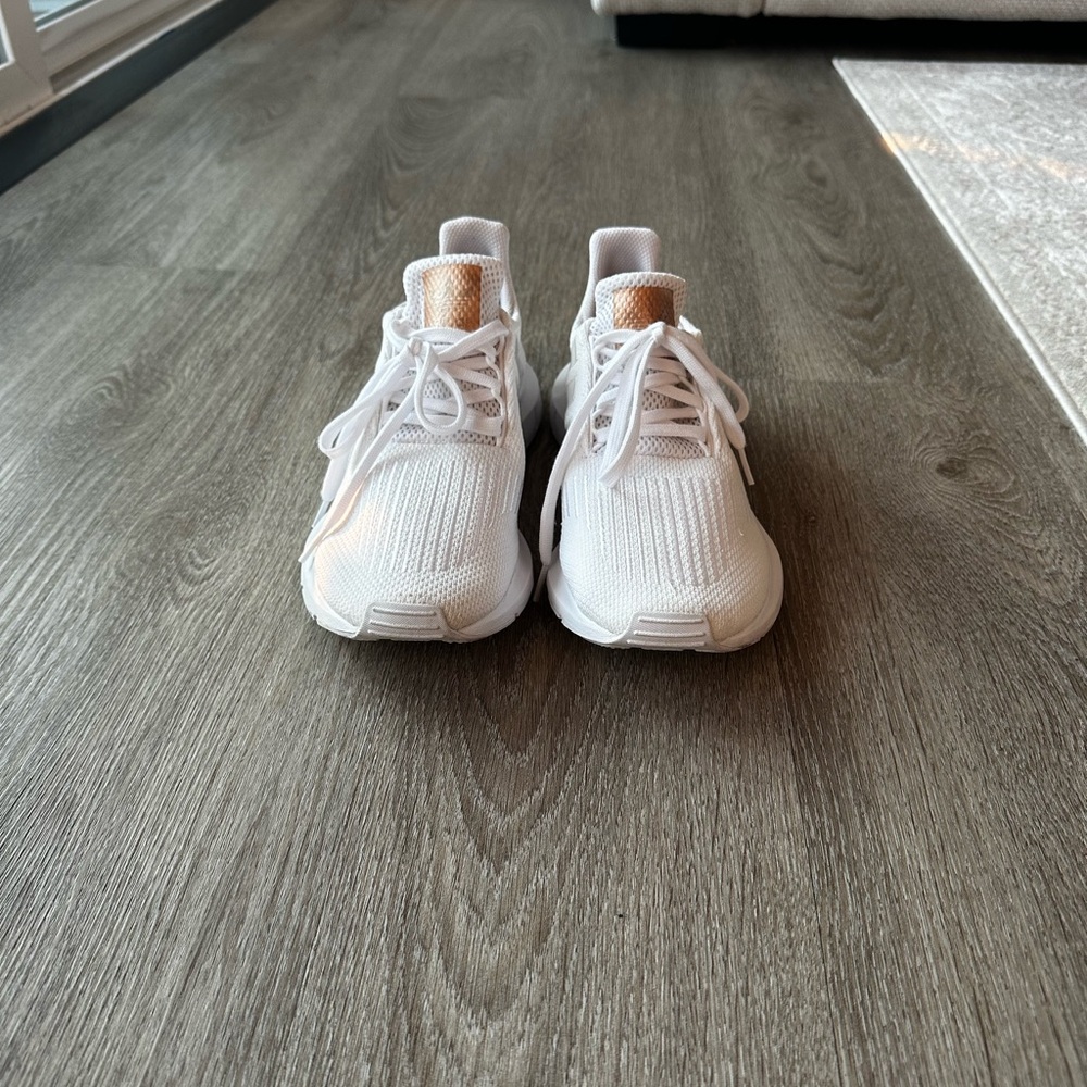 adidas White Athletic Shoes with Gold Accents